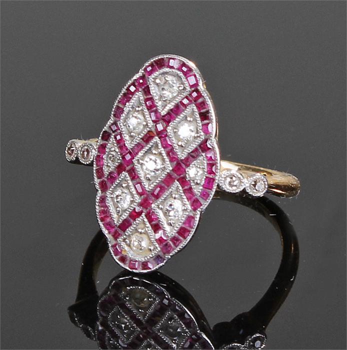 Art Deco 18 carat gold ruby and diamond ring, the diamond and ruby set head with criss cross