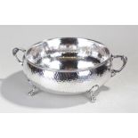 Art Nouveau silver plated bowl, the hammered bowl with scroll handles and cabriole feet, 31.5cm