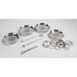 Mixed silver to include four Churchill crown set dishes, four napkin rings, a pair of tongs and a