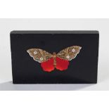 Pietra Dura butterfly paperweight, with an inset red and naturalistic butterfly, 12cm wide