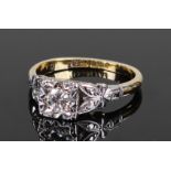 18 carat gold and diamond ring, the central diamond with leaf shoulders, ring size K