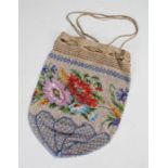 Victorian bead bag, the polychrome beads with foliate decoration and geometric pattern, 28cm high