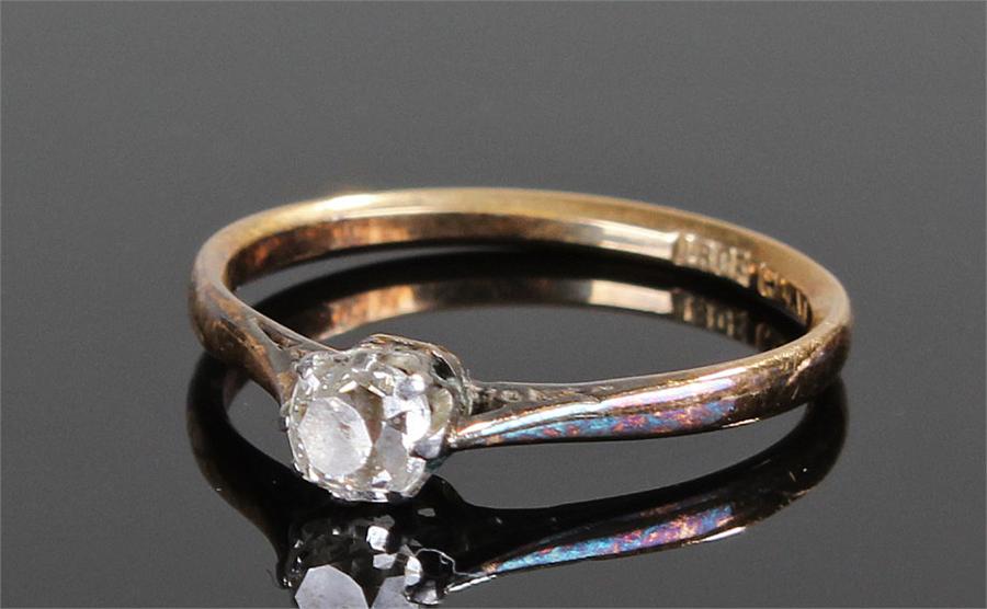 18 carat gold and diamond set ring. The old cut diamond at approximately 0.40 carat, ring size O