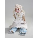 German bisque porcelain doll with blue eyes, missing one hand, 31cm high