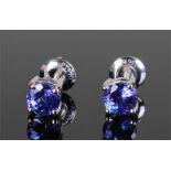 Pair of platinum and tanzanite studs each with a round cut tanzanite with four claws