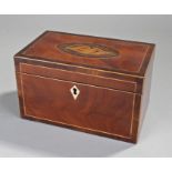 George III mahogany and inlaid tea caddy, the shell inlaid top with boxwood stringing, crossband