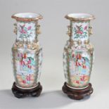 Pair of late 19th Century Chinese Canton vases, polychrome painted with Chinese figural scenes,