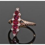 Unusual 18 carat gold diamond and ruby set ring. With a vertical row of diamond and rubies, the