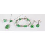 9 carat white gold and jade jewellery set to include a ring, earrings, necklace and bracelet, each