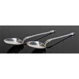 Pair of Danish silver spoons maker Funck. The finial tops with a portrait face to the front and