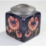 Tudric Liberty Moorcroft Biscuit Barrell, square form with hammered pewter lid, dark blue ground