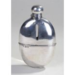 Victorian silver hip flask of large proportions, London 1895. The hinged cap above an oval case