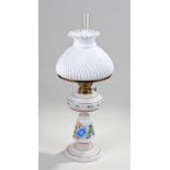 Victorian milk glass oil lamp, the glass chimney above a milk glass shade and milk glass foliate