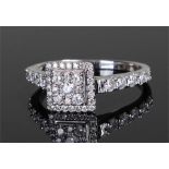 18 carat white gold and diamond ring, the cluster of diamonds to the head forming a square stepped