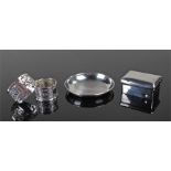 Mixed silver to include two napkin rings, a silver dish and an Asprey silver box, total weight 6.4oz