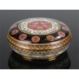 Chinese cloisonné box, the geometric designed lid enclosing a blue interior, scroll base, 6.5cm wide