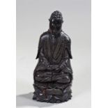 19th Century ebony and silver inlaid figure of Buddha. The silver inlaid to the body front and