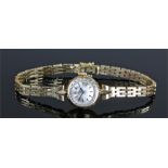 Certina 18 carat gold ladies wristwatch, the circular silvered dial with baton hours, personally