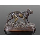 After Jules Moigniez (French 1835-1894) a bronze figure of a lurcher looking back, 8.5cm long