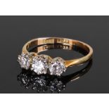 18 carat gold diamond set ring, set with three diamond across the head, ring size M