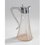 George V Claret jug, Birmingham 1916, makers mark rubbed. The silver top with arched handle, cut