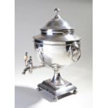 19th Century silver plated samovar. The ball finial above a lidded urn, a pair of carrying