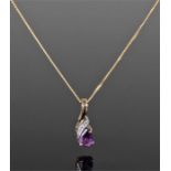 9 carat gold amethyst and diamond necklace pendant. The amethyst and diamond set pendant drop with a