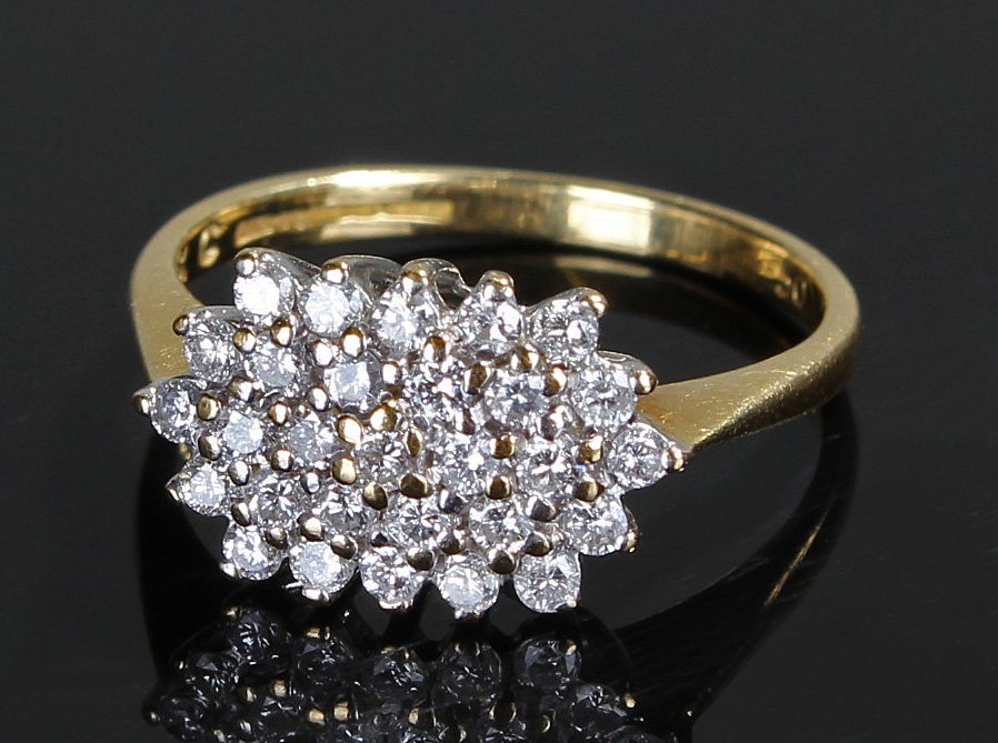 18 carat gold diamond cluster ring, the head set with twenty-nine diamonds, ring size L