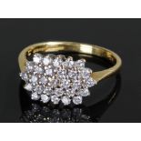 18 carat gold diamond cluster ring, the head set with twenty-nine diamonds, ring size L