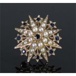 9 carat gold sapphire and pearl brooch of star form with projecting stars set with sapphires,