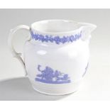 19th Century creamware jug, with pale blue applied decoration, 14cm high
