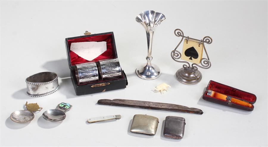 Mixed lot, to include a cigarette holder, a fruit knife, a trump marker, silver flower vase, a