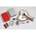 Cased meerschaum pipe, in the form of a hand holding a bowl, together with saving books, vesta, etc,