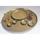 Mixed brass, to include two trays, a pair of sticks, a bell and three dishes, (8)