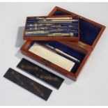 Draughtsman set, some pieces marked Elliott, within a mahogany box