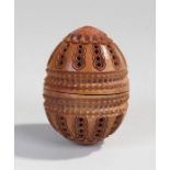 19th Century coquilla nut box, carved as a pierced egg