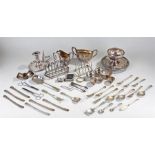 Mixed silver plated wares, to include two toast racks, a silver salver, bowl, salts, cutlery, jug,