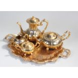 Modern gold plated teaset, comprising of a teapot, coffee pot, sugar bowl, cream jug and tray (5)