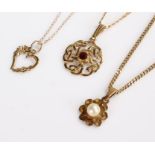 Three 9 carat gold necklaces, each with pendants, total weight 9.9 grams