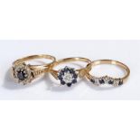 Three 9 carat gold rings, each with sapphires, (3)