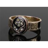 Victorian mourning ring, the yellow metal ring with enamel and pearl decoration centred by a