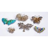 Collection of six butterfly brooches, to include: three filigree examples, an enamel and seedpearl