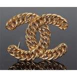 Large Chanel gold plated brooch, of interlinking "C" form, 7cm in width