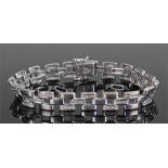 18 carat white gold and diamond bracelet, of rectangular link form with alternating links with