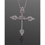 14 carat gold diamond set cross and chain, the cross set with approximetly 60 diamonds to from the