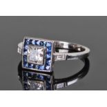 White metal diamond and sapphire ring, the central square cut diamond approximately 0.5 carat,