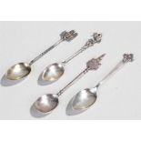 Four silver teaspoons comprising a Shetland Silver example, a Westminster Abbey souvenir spoon, a