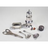 Silver and plated wares to include a silver pill box, plated grape scissors, plated jewellery box,