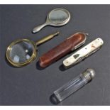 Mother of pearl handled utility knife, together with a brass framed looking glass, a small mirror