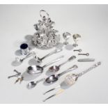 Collection of silver plated items to include; an egg stand, egg cups, assorted spoons, button hooks,